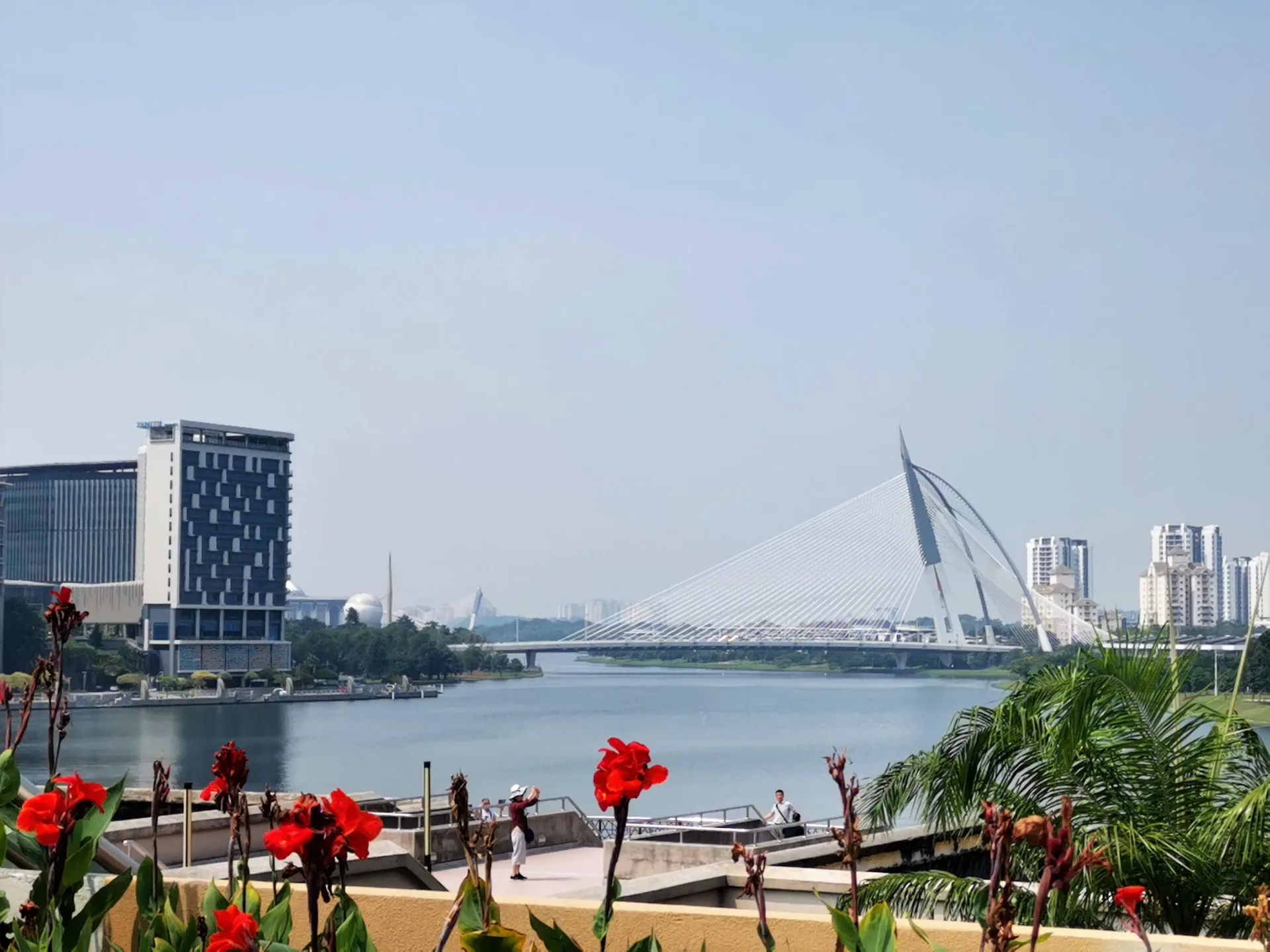 A sail-shaped cable-stayed bridge across the lake in Putrajaya